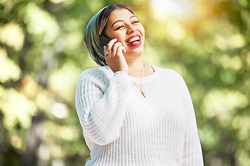 Image showing Woman, phone call and talk with laugh in park, communication and funny chat in summer sunshine. Muslim student girl, smartphone and comic conversation with listening, contact and thinking outdoor