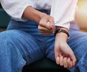 Image showing Watch, sleeve and hands of person with anxiety at an outdoor park with worry and jewelry fashion in nature. Manicure, ring and nervous woman with a classy wrist accessory and cosmetic nail polish