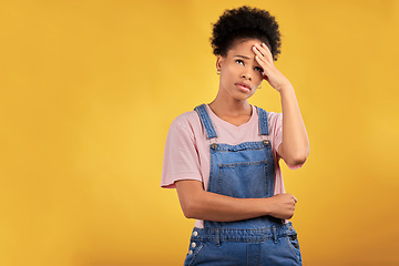 Image showing Stress, headache and woman in studio annoyed, confused and brain fog on yellow background. Anxiety, migraine and female model with vertigo, crisis or mistake, fail o or frustrated by depression