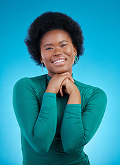 Image showing Smile, portrait and fashion with black woman and hands in studio background with positive mindset. Happy, face and confidence with african person or motivation or proud expression in blue background.