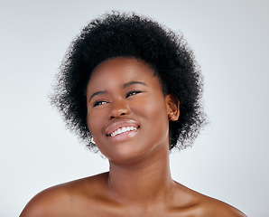 Image showing Skincare, natural hair and face with black woman on white background for cosmetic wellness in studio. Beauty, dermatology and african girl with shine for treatment and healthy glow on mock up.