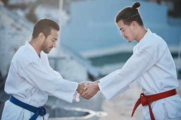 Image showing Men, karate and shaking hands at training fight with respect, fitness and start workout contest for development. Martial arts coaching, together or peace for exercise, zen mindset or combat sports