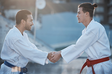 Image showing Men, karate and handshake at training fight for respect, fitness or workout contest for development. Martial arts teacher, coaching and smile for exercise, zen mindset or outdoor for combat sports