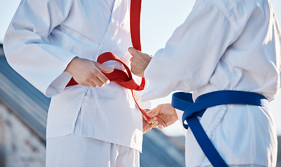 Image showing Karate, belt and people outdoor for training, workout or fitness achievement in city. Martial arts, sports and coach with student for taekwondo competition, battle and challenge to fight or exercise