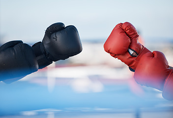 Image showing Hands, boxing gloves or sports training, exercise or fist punching with strong power in workout. Background, fitness athletes or combat warriors ready for boxing or fighting in a mma practice match