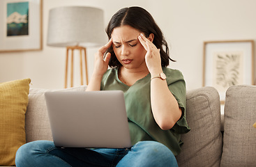 Image showing Woman, home and headache with laptop learning and remote work stress on a sofa feeling frustrated. House, female person and confused from computer problem with anxiety from online website project