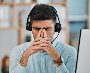 Image showing Stress, call center and headache of man in customer service agency with pain, burnout or anxiety. Face, frustrated and tired salesman consulting with challenge, client problem and fatigue for mistake