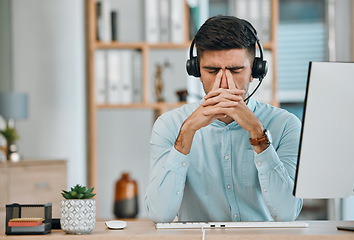 Image showing Stress, call center or headache of man at computer, telemarketing agency and fail in pain, burnout or anxiety. Frustrated, sad or tired salesman in challenge, client problem and crisis of CRM mistake