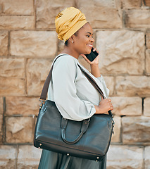 Image showing Phone call, walking in city and business black woman for contact, network and connection in town. Travel, corporate and African female person on smartphone for talking, conversation and communication