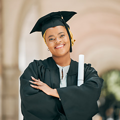 Image showing Happy, smile and portrait of woman at graduation with degree, diploma or certificate scroll. Success, education and young African female university graduate with crossed arms for confidence on campus