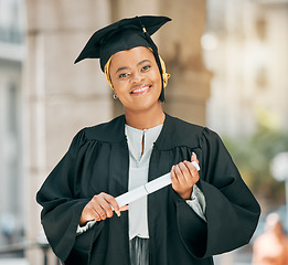 Image showing Success, university and portrait of woman at graduation with degree, diploma or certificate scroll. Achievement, education and young African female college graduate with crossed arms for confidence.