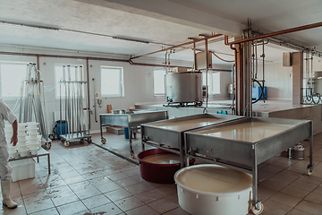 Image showing The interior of a modern factory for the processing of dairy products and the production of various types of cheese