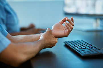 Image showing Person, hands and wrist pain in surveillance from injury, accident or carpal tunnel syndrome at office. Closeup of security guard with sore arm, ache or joint inflammation from overworked typing