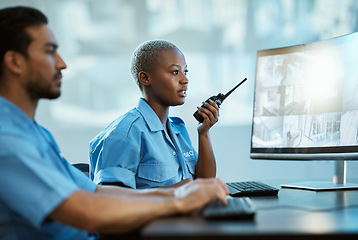 Image showing Security guard, safety and control room with a radio and computer monitor for surveillance. Man and woman working together for crime investigation, cctv screen and communication with a walkie talkie