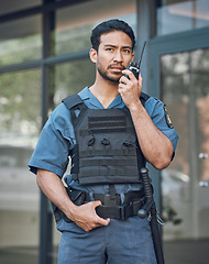 Image showing Man, radio and a security guard or bodyguard outdoor on in a city with communication. Safety officer person with a walkie talkie at a building to report crime for investigation and surveillance