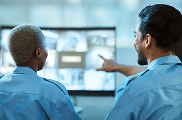 Image showing Safety, security guard team and control room with a computer screen for surveillance. Behind a woman and man pointing at cctv monitor for crime investigation, supervision and monitoring live camera