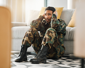 Image showing Soldier, depression and ptsd with man in living room for anxiety, stress and psychology. Army, military and war veteran with person and trauma at home for mental health, bipolar and schizophrenia