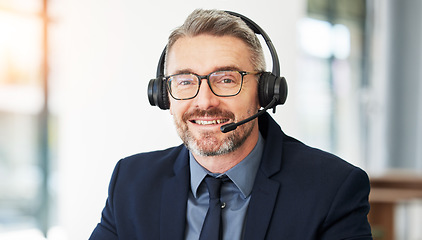 Image showing Call center, portrait and senior man with CRM and contact us, headset for communication and professional headshot. Telecom, customer service and male consultant with help desk employee and mic