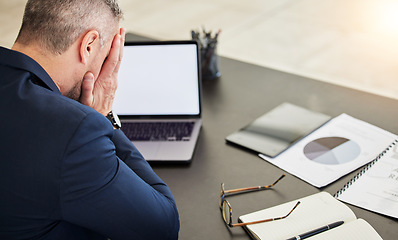 Image showing Business man, headache and tired by laptop, report and chart documents with mockup space on screen. Mature CEO, boss or leader with hands on face, paperwork and pc for audit, accounting and fatigue