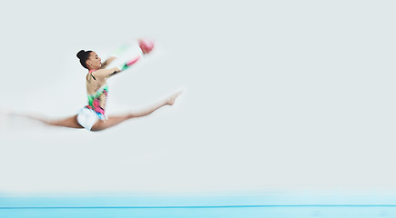 Image showing Gymnastics, jump and woman with ball in performance to exercise, train and mockup space. Sports, moving and dancing gymnast, athlete or person in competition for creative talent, energy and fast blur