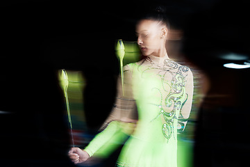 Image showing Gymnastics, blur and woman with clubs for dance, rhythmic body movement and training. Black background, health and female dancer in action for aerobics competition, exercise and dancing performance