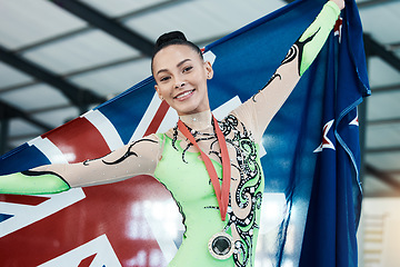 Image showing Medal, winner of gymnastics and portrait of champion with union jack, success in competition or gold, prize or award from achievement. Winning, athlete and celebration on podium in stadium or arena