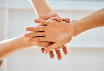 Image showing Hands stacked, support and group of people for teamwork, collaboration and community, team building and fitness goals. Mission, workout and together sign in sports or circle for exercise from below