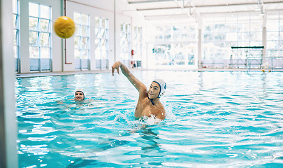 Image showing Sports, ball and water polo with man in swimming pool for fitness, training and games. Championship, workout and performance with person and teamwork in competition for health, wellness and target