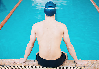 Image showing Swimming, sports and man in pool for training, competition and exercise in water. Professional swimmer, fitness and back of male person practice for challenge, workout and performance for wellness