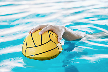 Image showing Ball, hand and water polo, swimming pool and sports with fitness, athlete and training for game. Person, swimmer and equipment with exercise, closeup and aquatic workout with challenge and match