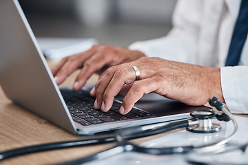 Image showing Doctor, hands and laptop for healthcare research, hospital management and admin or planning and clinic information. Medical professional working or typing on computer for telehealth services and FAQ