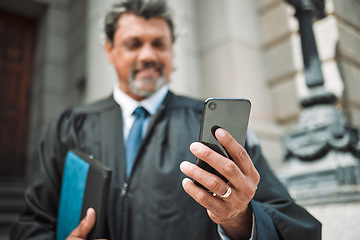 Image showing Senior attorney man, phone and street with smile, thinking and hand with ideas internet app in metro. Happy mature judge, smartphone and reading for notification, web chat and social media in city