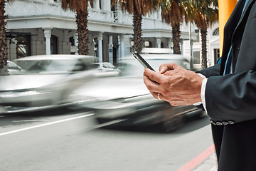 Image showing Hands, phone and commute with a business man in the city using an app for location, navigation or direction. Mobile, travel and communication with a male employee typing a message in an urban town