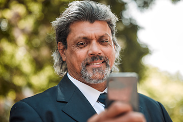 Image showing Face, phone and communication with a business man outdoor on his morning commute for work. Mobile, contact and networking with a senior male CEO or manager reading a text message or social media post