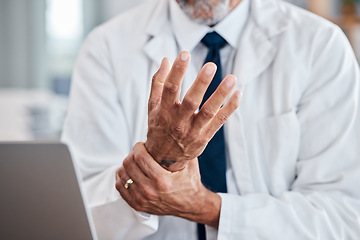 Image showing Laptop, wrist pain and hands of business man in office for injury, stress and arthritis. Burnout, emergency and inflammation with closeup of employee for carpal tunnel, accident and medical risk