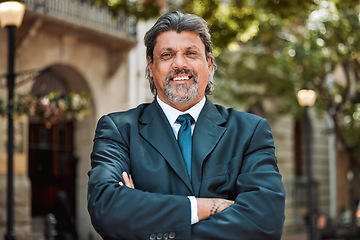 Image showing Senior man, executive with arms crossed and smile in portrait outdoor, career success and pride in business. Professional mindset, male CEO and confidence, happy in city with company vision and goals