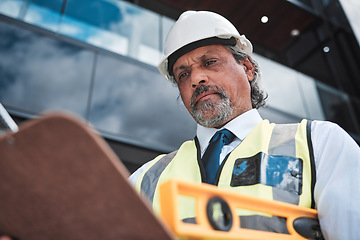 Image showing Architecture, checklist and man with tools for construction site inspection, compliance or project management in city. Contractor, manager or person in urban engineering, outdoor and clipboard survey