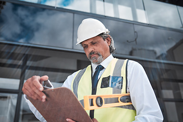 Image showing Engineering, checklist and man for construction site inspection, compliance or project management in city. Outdoor architecture, documents check or clipboard of contractor, manager or person progress