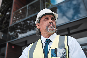 Image showing Thinking, ideas and engineering man at outdoor building, construction site and vision for urban development. Planning, inspection and architecture person or project manager design inspiration in city