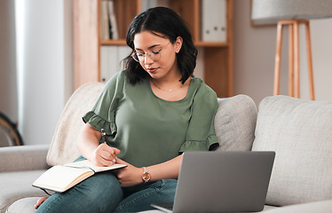 Image showing Woman, student and laptop, writing in notebook and planning schedule, work from home or online education on sofa. Person with journal ideas or studying in college or university e learning on computer