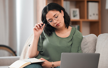 Image showing Woman, student and laptop, notebook and thinking or studying and planning schedule for work from home. Person with journal ideas for online education, e learning and knowledge on sofa and computer