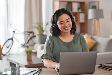 Image showing Consulting, remote work and woman with laptop for call center communication and consultation. Smile, advice and young female customer service agent typing on a computer from a house for telemarketing