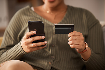 Image showing Hands, woman and credit card with phone for online shopping, digital payment and fintech account at home. Closeup of person, mobile banking and finance money for web sales, password and ecommerce app