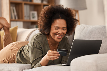 Image showing Black woman, credit card and laptop on sofa for online shopping, digital payment and fintech account. Happy female person, computer banking and money for sales, password and ecommerce finance at home