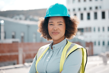 Image showing Portrait, engineer and confident woman on city rooftop for career in renewable energy. Face, architect and serious developer, solar contractor with helmet and employee from South Africa outdoor