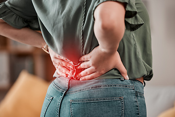 Image showing Red, back and pain of woman with injury problem, health risk or muscle inflammation at home. Closeup of uncomfortable female person with glow on spine of bad posture, backache and stress of body