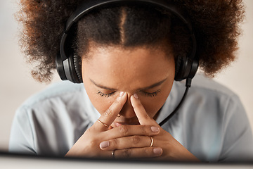 Image showing Woman, headache and call center in office with pain, headphones or mic for crm with fatigue. African girl, customer service and burnout with stress for contact us, help desk or telemarketing career