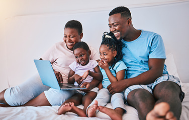 Image showing Laptop, black family and relax in a bed with movies, games and streaming in their home. Online, film and children with parents in bedroom for weekend fun, subscription or cartoon, care and smile