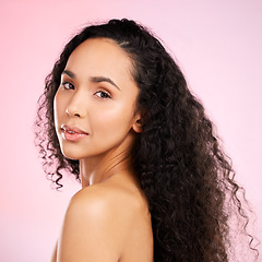 Image showing Beauty, portrait and skincare with african woman for glow with dermatology on body and pink background. Facial treatment, haircare and black girl with a natural face in studio for luxury treatment.