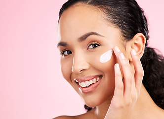 Image showing Skincare, cream and portrait of woman in studio for wellness, spa treatment and cleaning. Dermatology, beauty and face of happy female person with cosmetics product, moisturizer and anti aging lotion